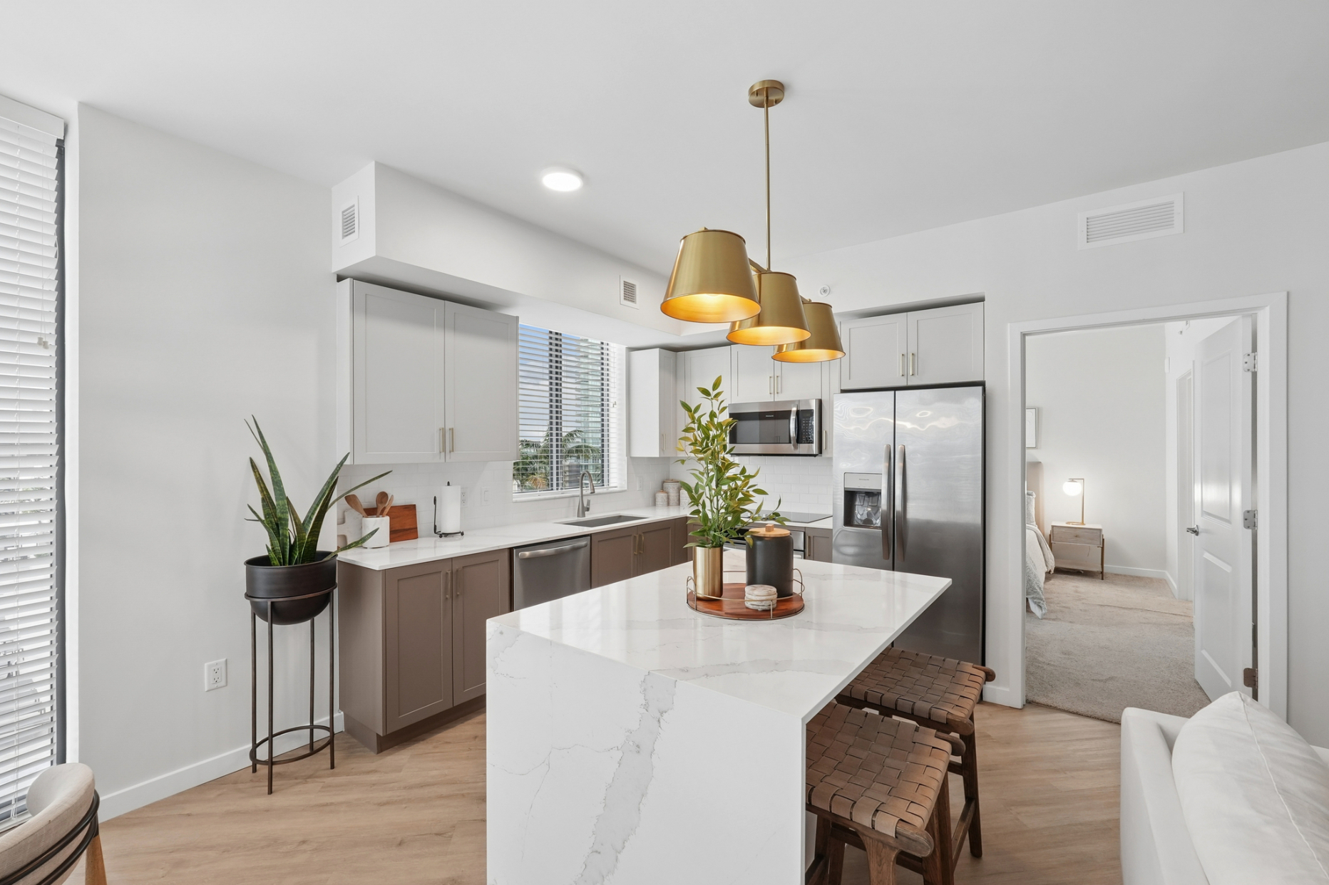 Evo apartment kitchen with waterfall island - St. Petersburg, FL